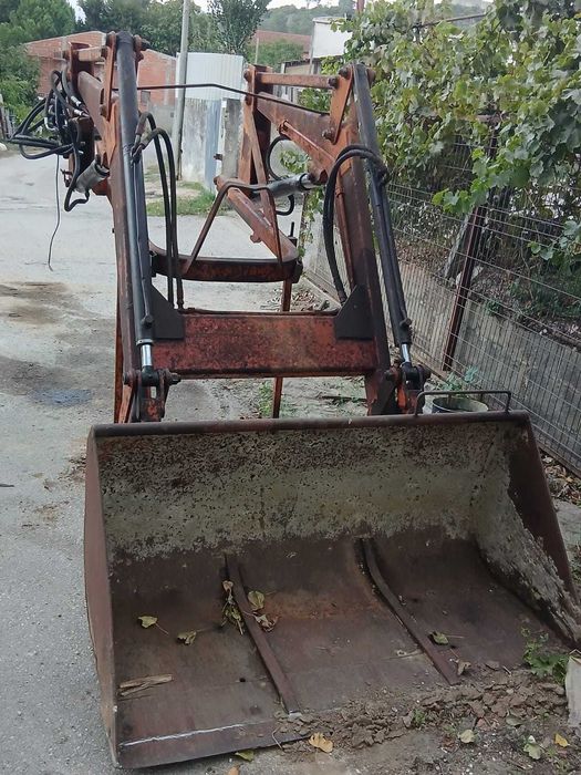 Carregador frontal tenias