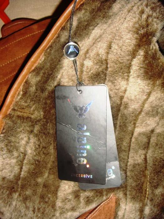 Новая женская дубленка 48-50