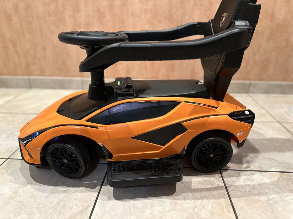 Дитяча каталка-толокар Lamborghini з батьківською ручкою світлом фар