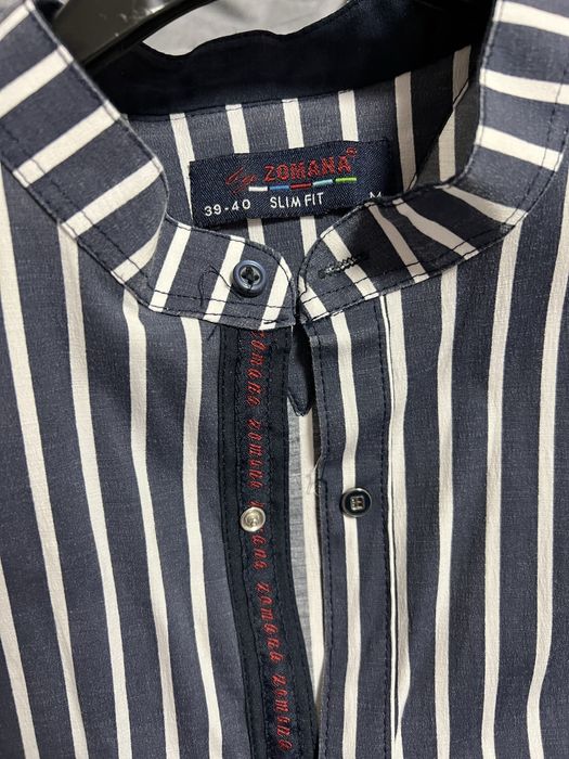 Стильна сорочка у смужку.