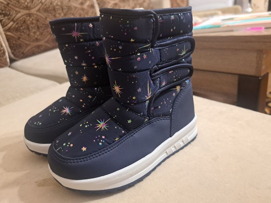 Продам зимові чоботи