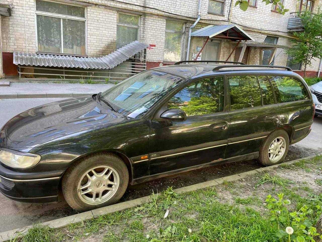 Opel Omega B (1998, 2.0 газ/бензин, універсал)