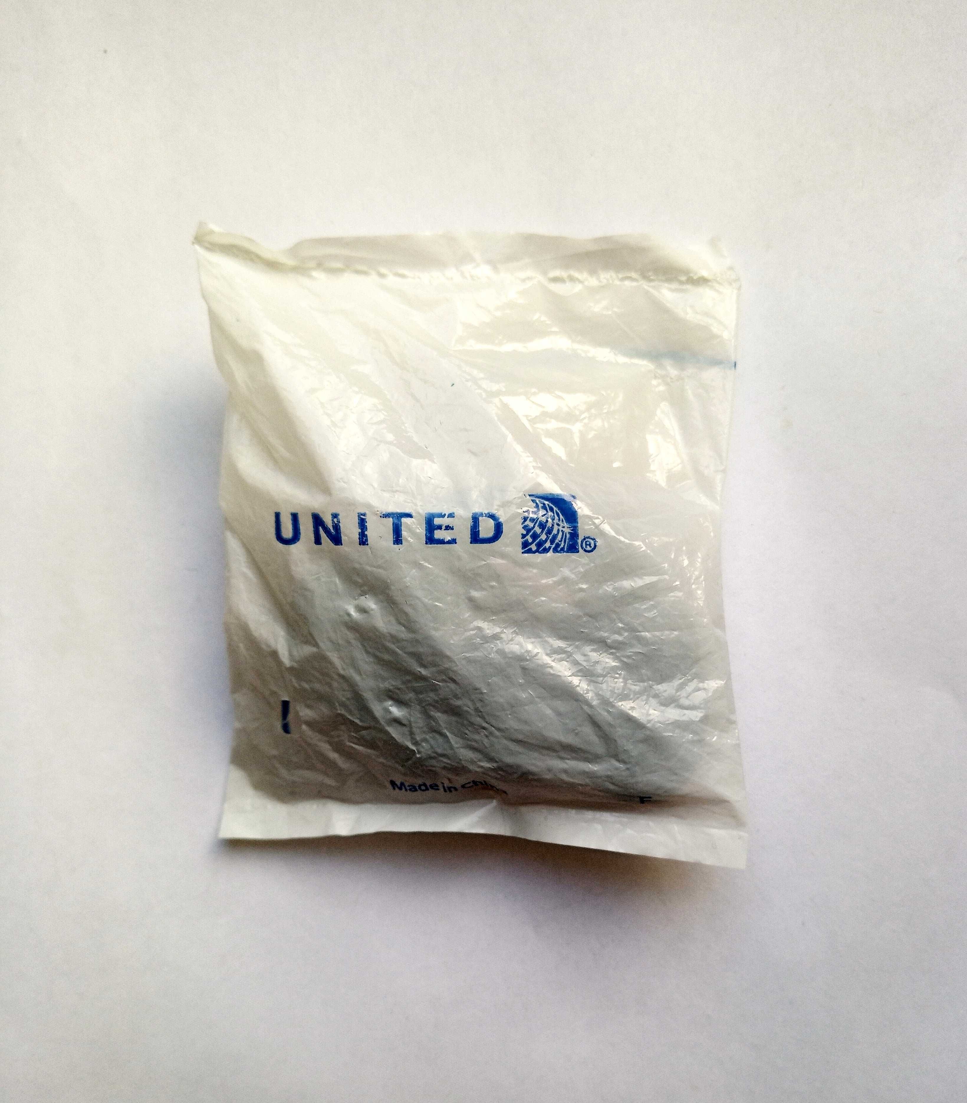 Дротові навушники Lufthansa Earphones (Kopfhorer) і United Airlines