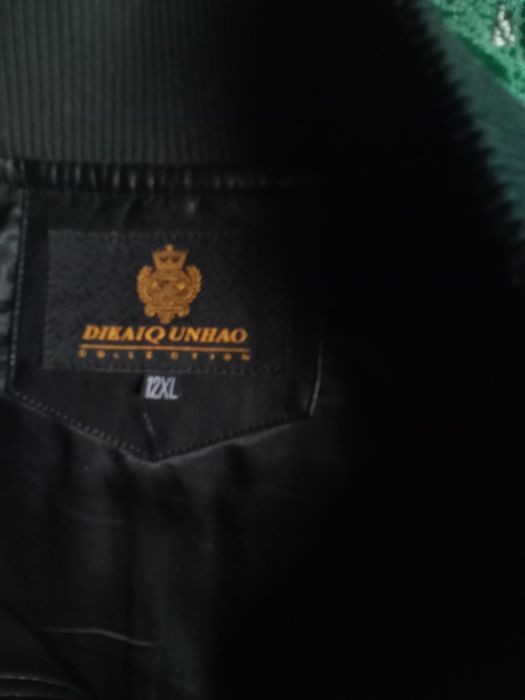 Чоловіча шкіряна демісезонна куртка. Розмір 12 XL. В доброму стані.