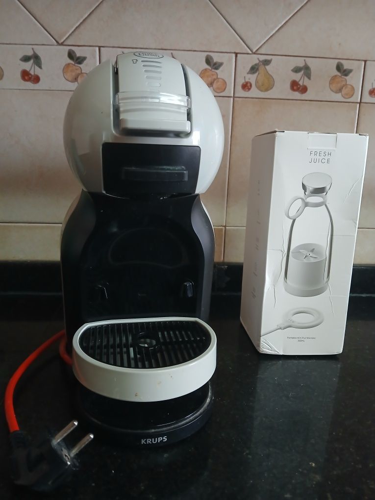 Maquina de cafe dolce gusto