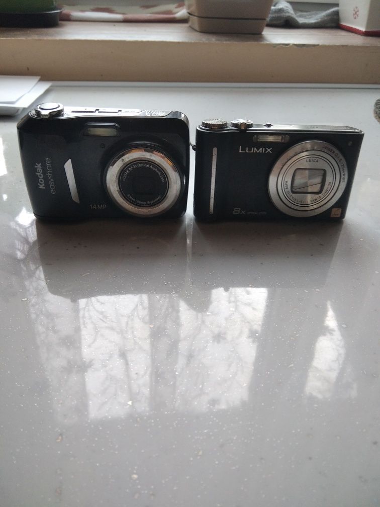 Aparaty fotograficzne Kodak i Lumix