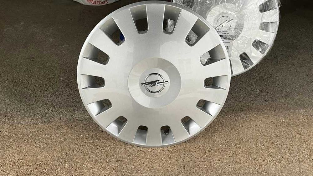 2 Tampões novos 14'' Opel Corsa c