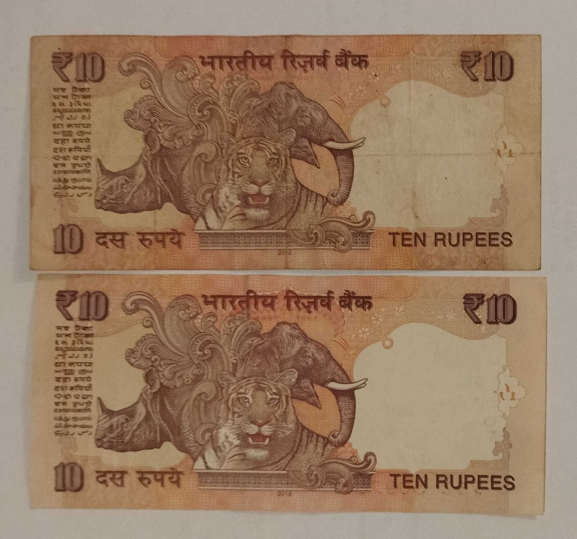 Banknoty indyjskie: 1.000, 100 i 10 rupii