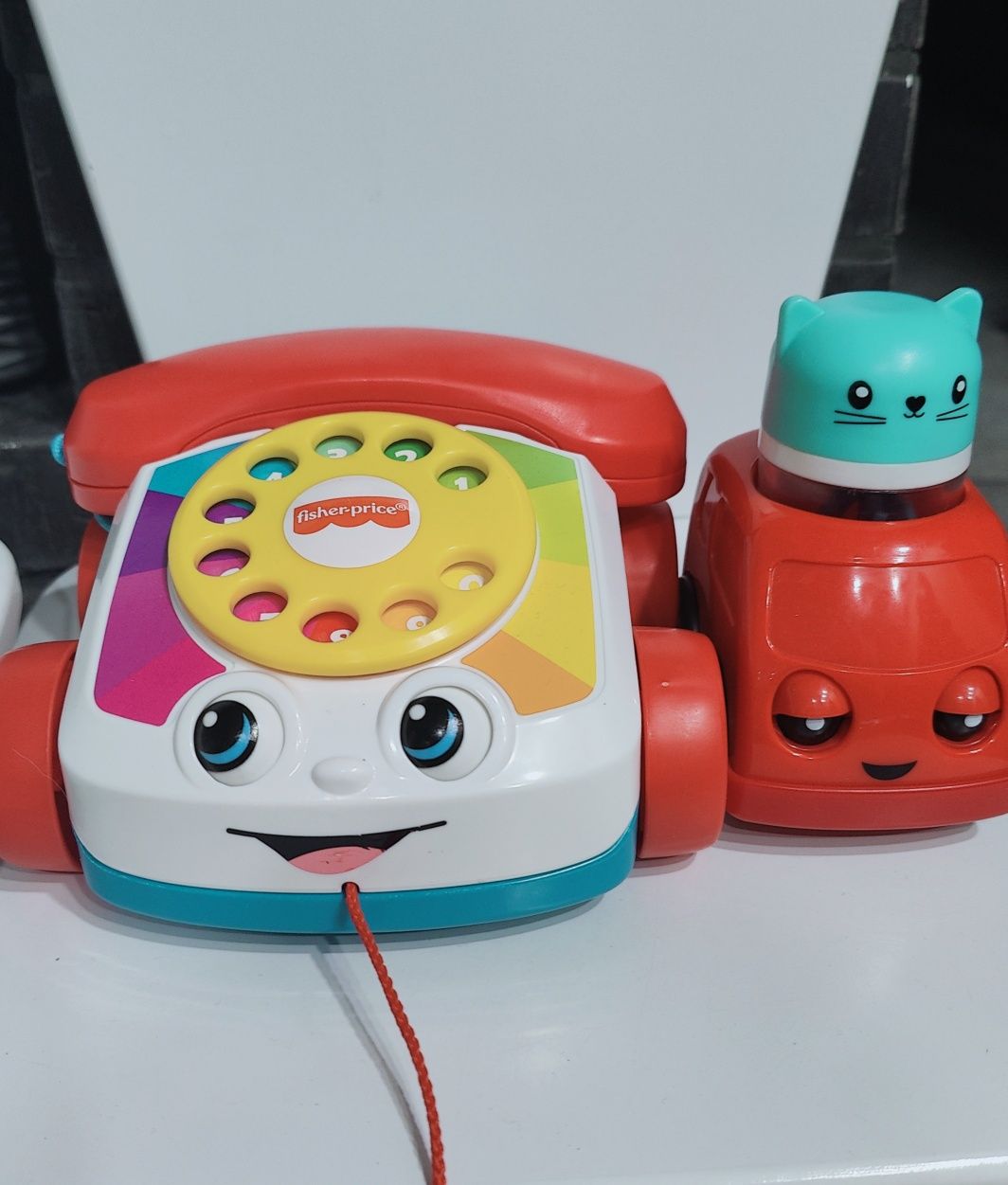 Fisher Price телефон машинка з глазками