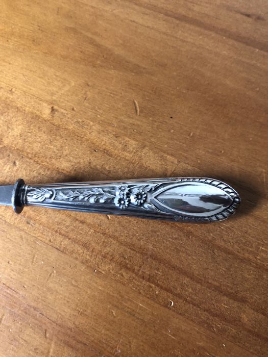 Colheres de bebe com cabo de prata