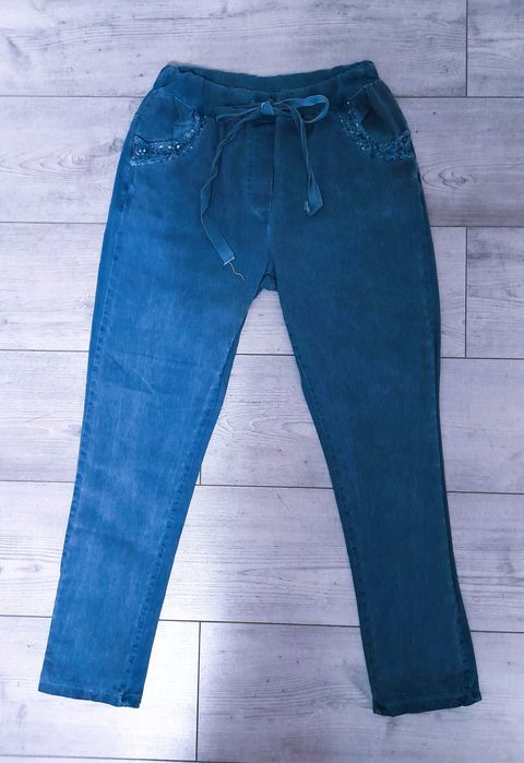 Niebieskie spodnie jeans plus dres cekiny