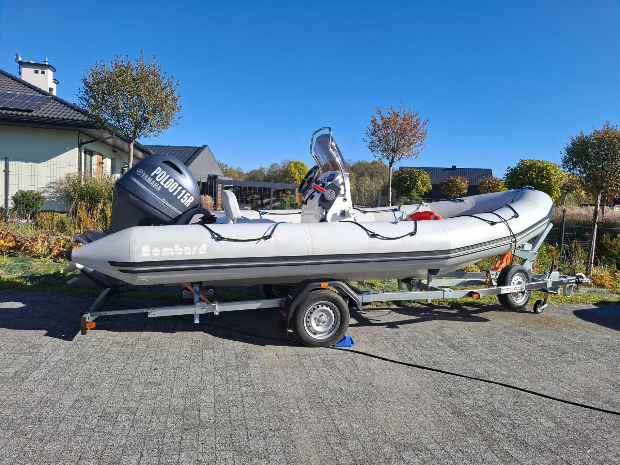 Sprzedam łódz motorową RIB sunrider 550 wraz z przyczepą .