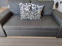 Vendo sofá-cama cinza em bom estado. (1x1,80)
