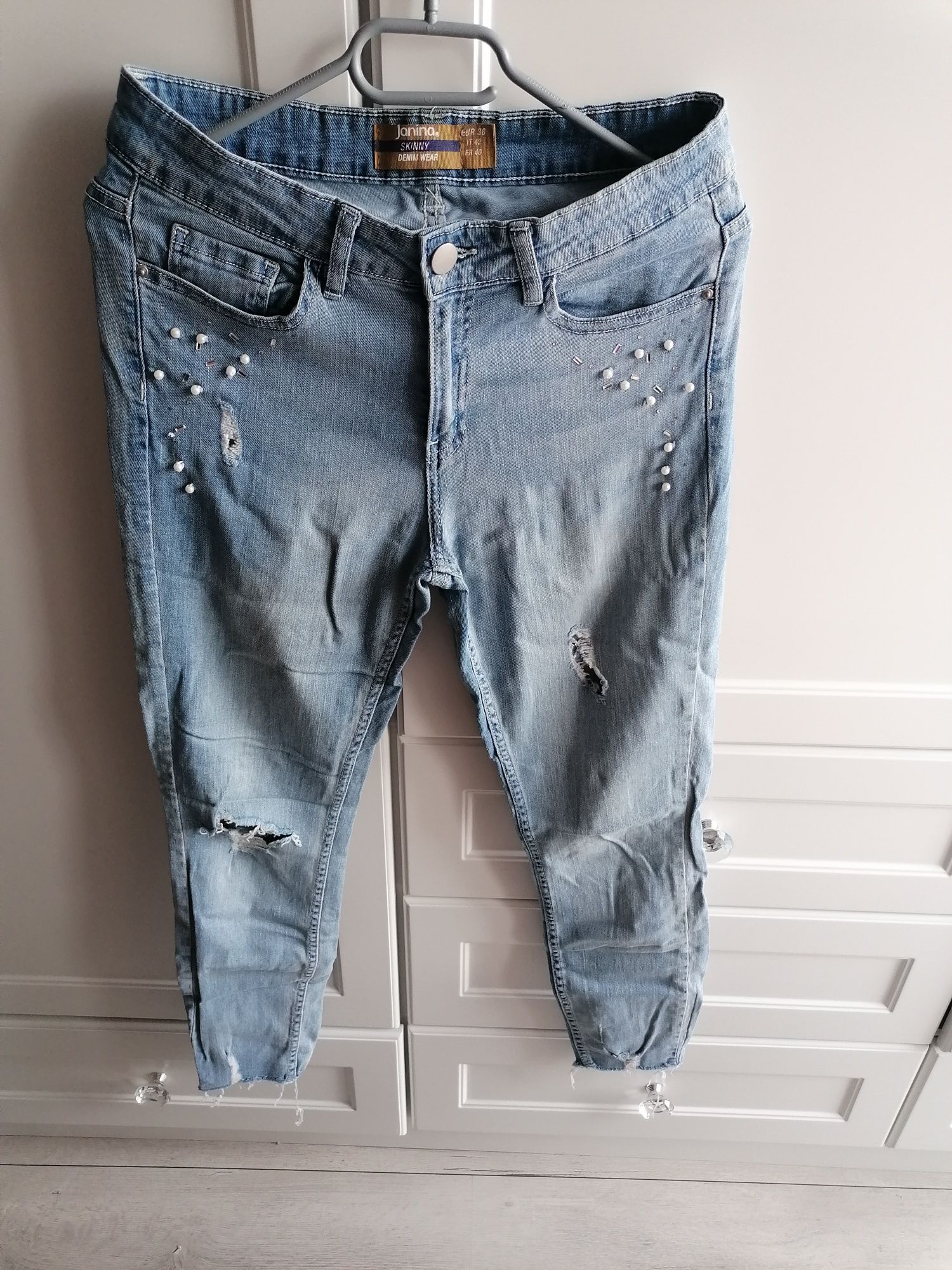 Spodnie jeansowe z dziurami koraliki r. 38 M