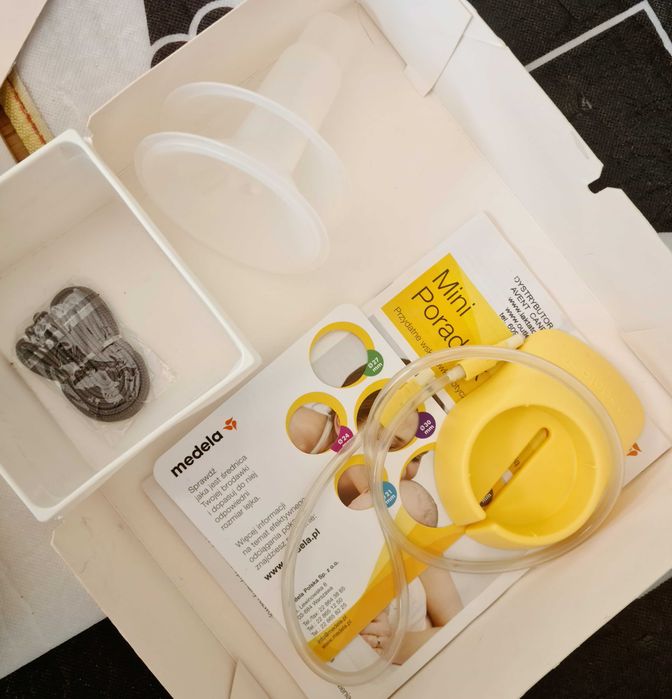 Kultowy laktator elektryczny Medela Swing + woreczki na pokarm