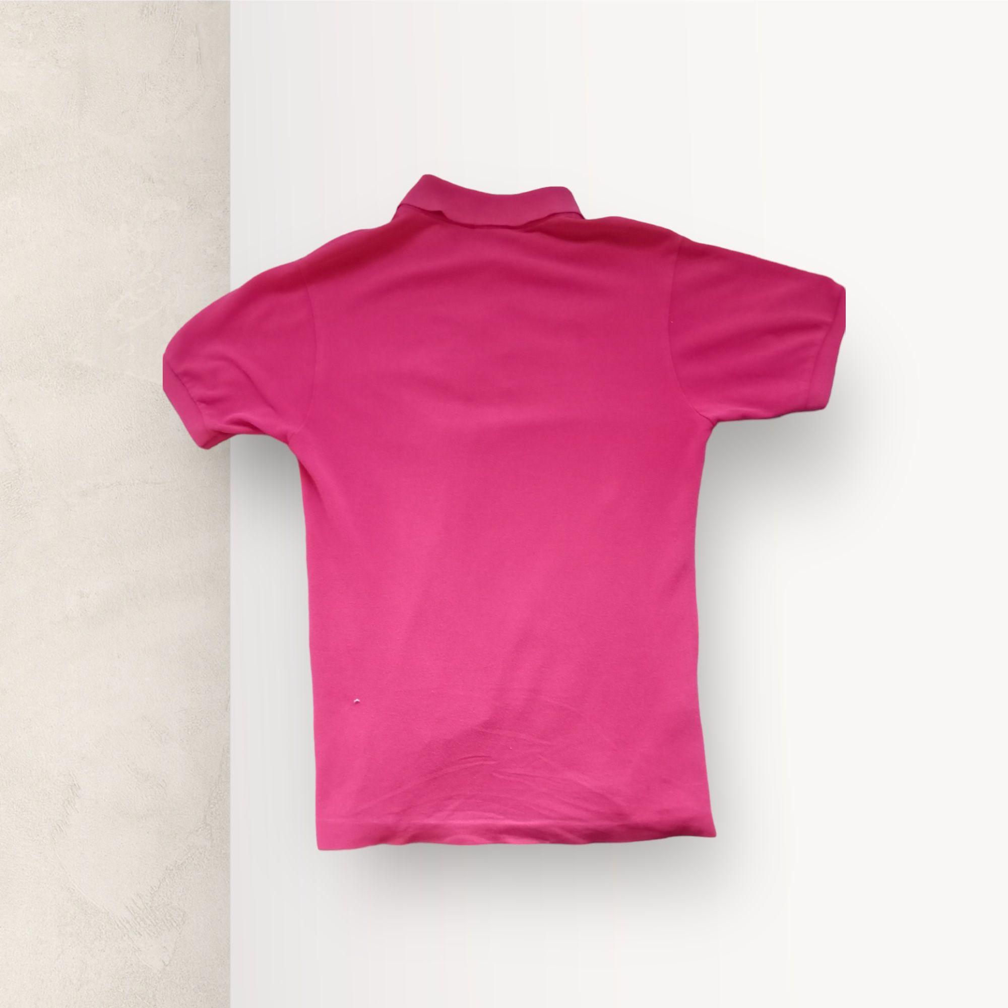Pink Lacoste polo