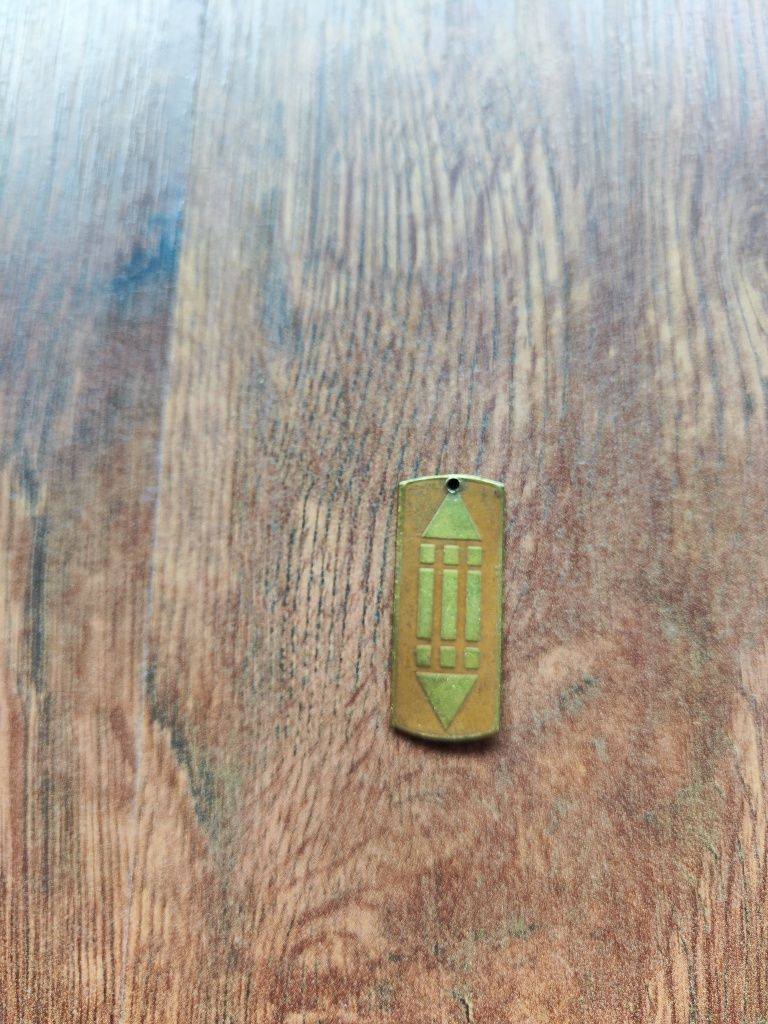 Zawieszka metalowa symbol atlantów