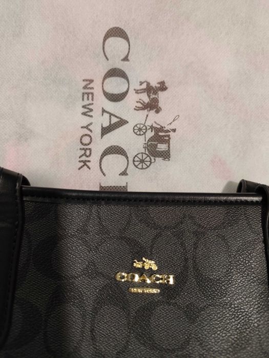 Mala Coach como nova