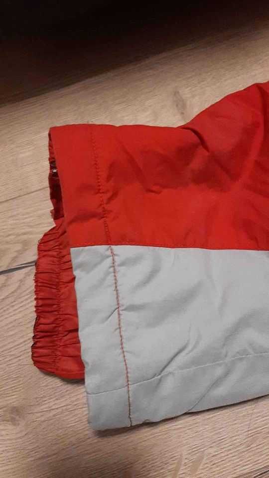 Kombinezon zimowy r 122-128 czerwony