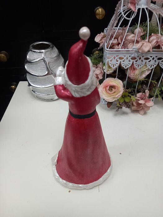 Pai natal em louça  que dá luz