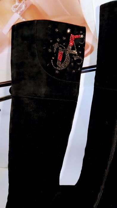 Высокие зимние сапоги