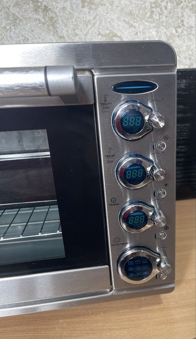 Духовка окремостояча з нержавіючої сталі