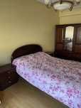 Quarto completo com móveis em madeira