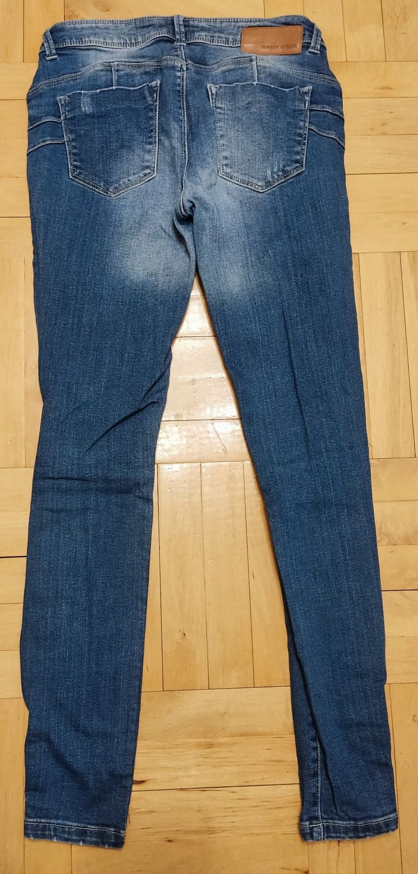 Spodnie jeansowe jeansy z przetarciami dziurami na kolanach