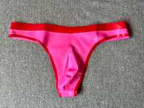 755/ Rozowo czerwone stringi majtki L meskie bielizna latex lateks