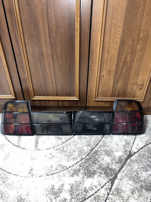 Фонарі HelIa Black на BMW E34