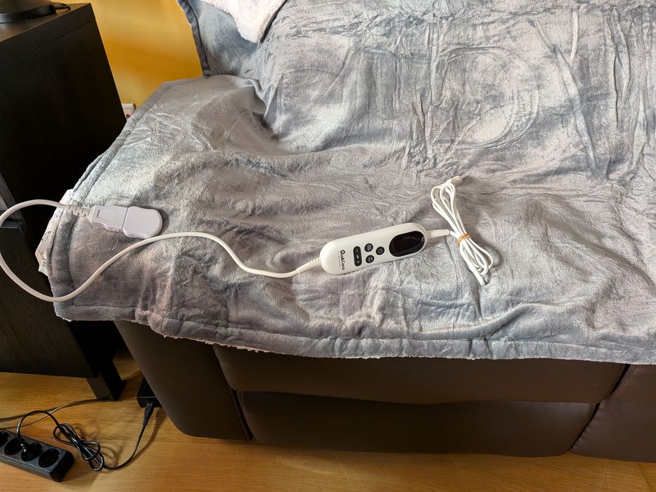 Cobertor elétrico cinzento aconchegante