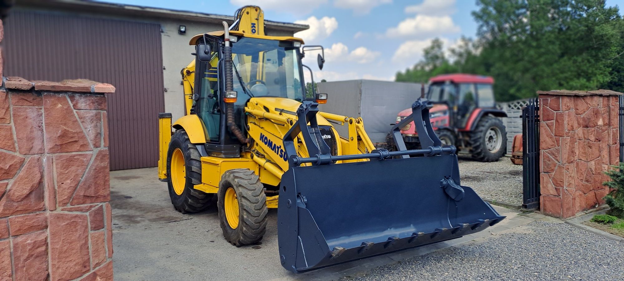 Koparko ładowarka Komatsu WB‑93R‑5