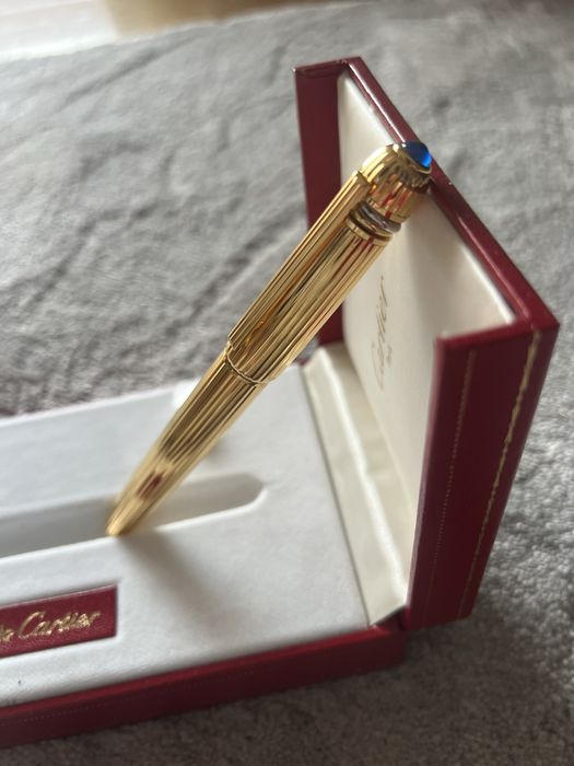 Caneta pasha cartier ouro