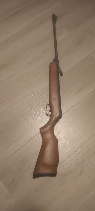 Arma de chumbo igual a nova