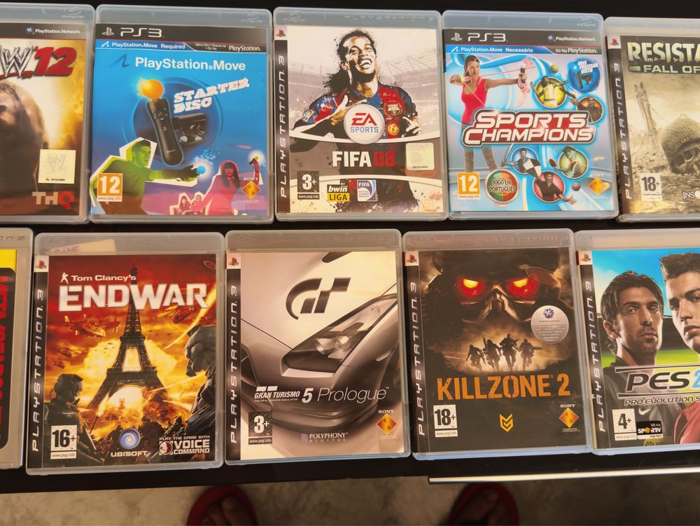 PlayStation 3 + 2 comandos + 15 jogos ( com leitor para reparacão)