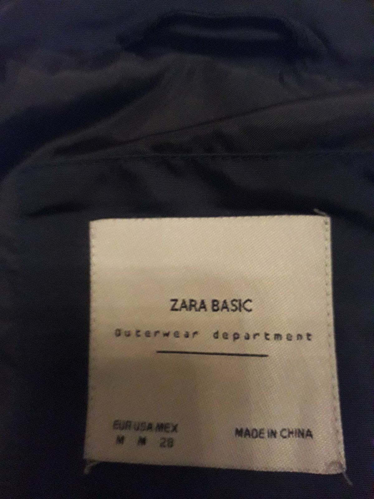 женский пуховик Zara.