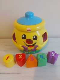 Garnuszek Fisher Price