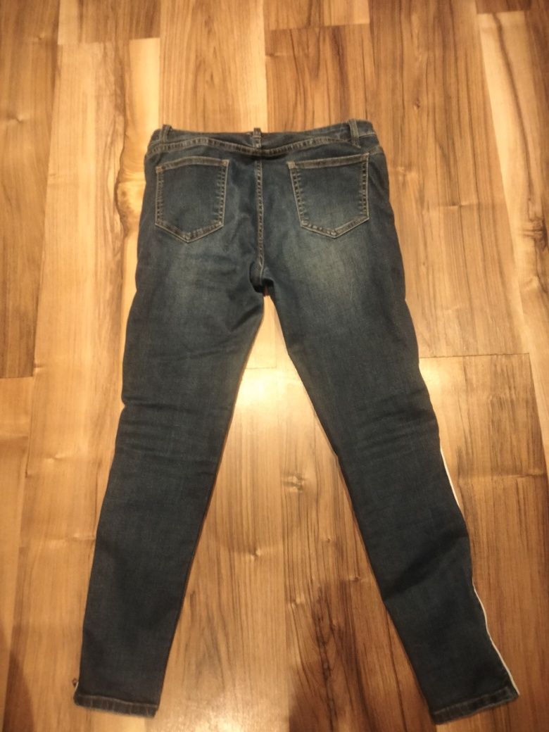 Spodnie jeans z suwaczkami na boku