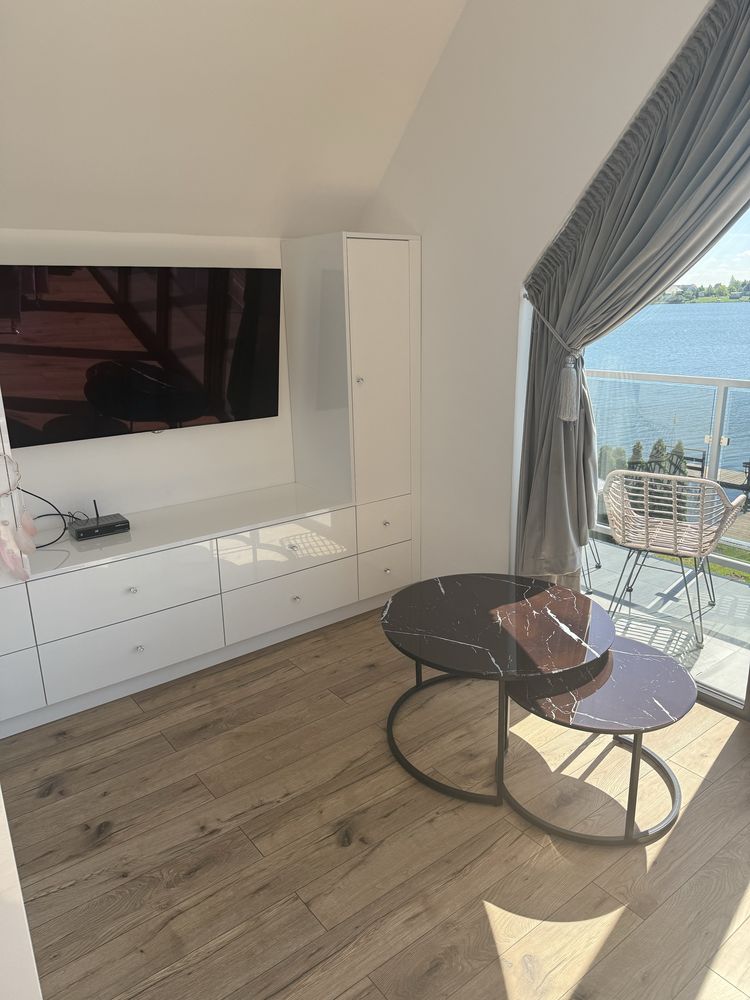 Domek nad jeziorem z jacuzzi, solarium, linia brzegową, sauna, plaża