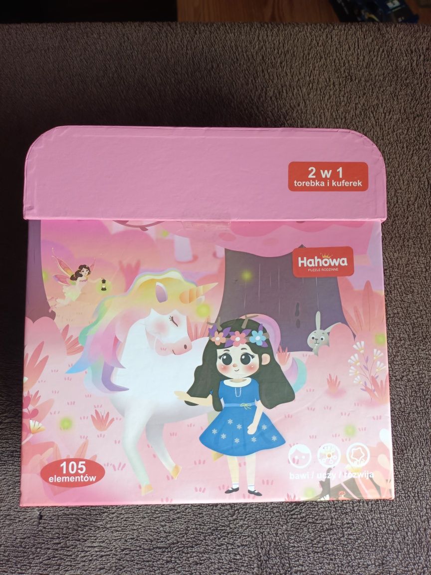 Puzzle rodzinne magiczny jednorożec 105 elem. 2w1 torebka i kuferek