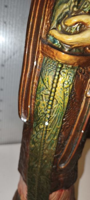 Estatueta chinesa usada