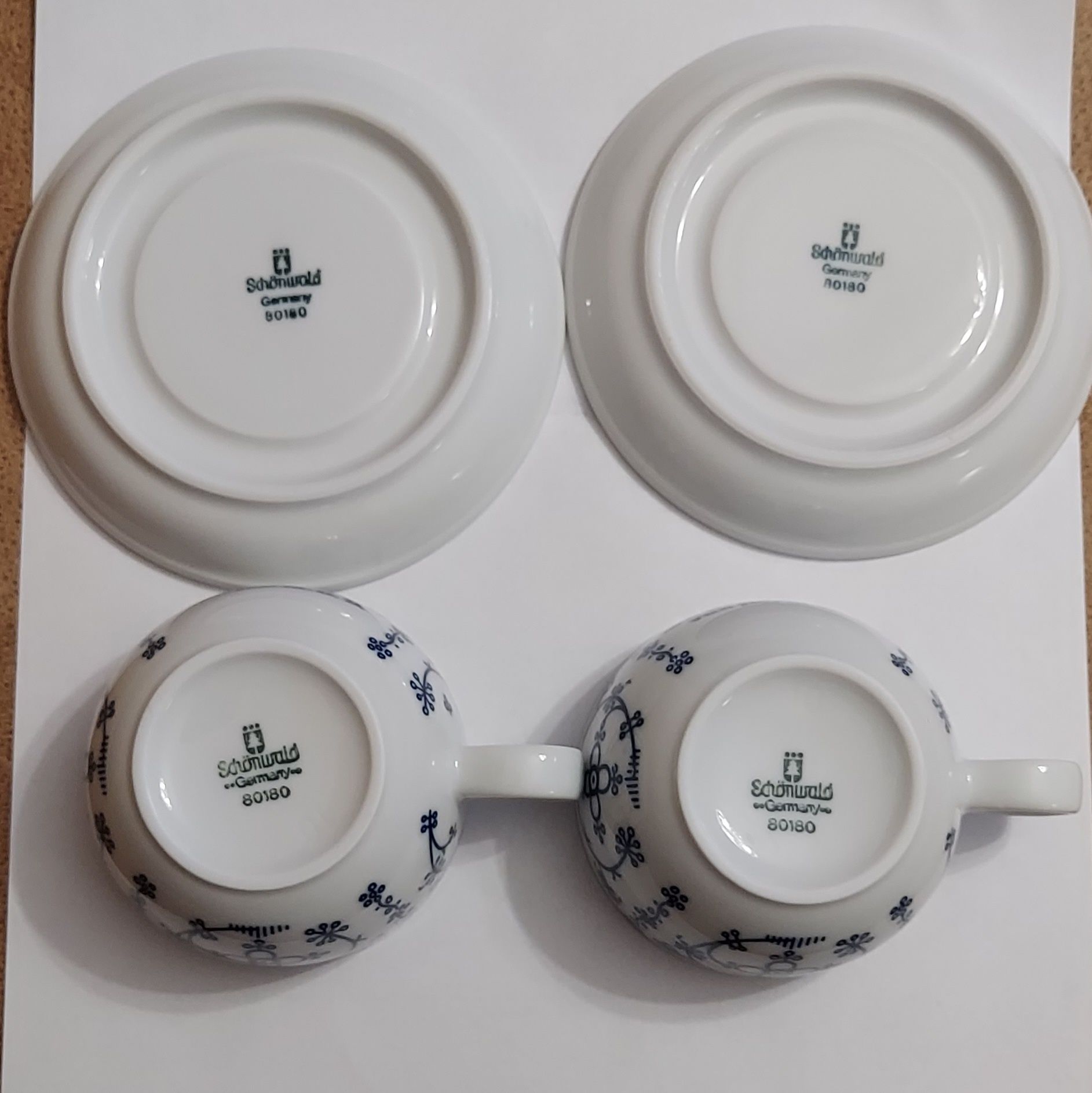2 komplety fryzyjskich filiżanek i spodków  porcelana Schönwald
