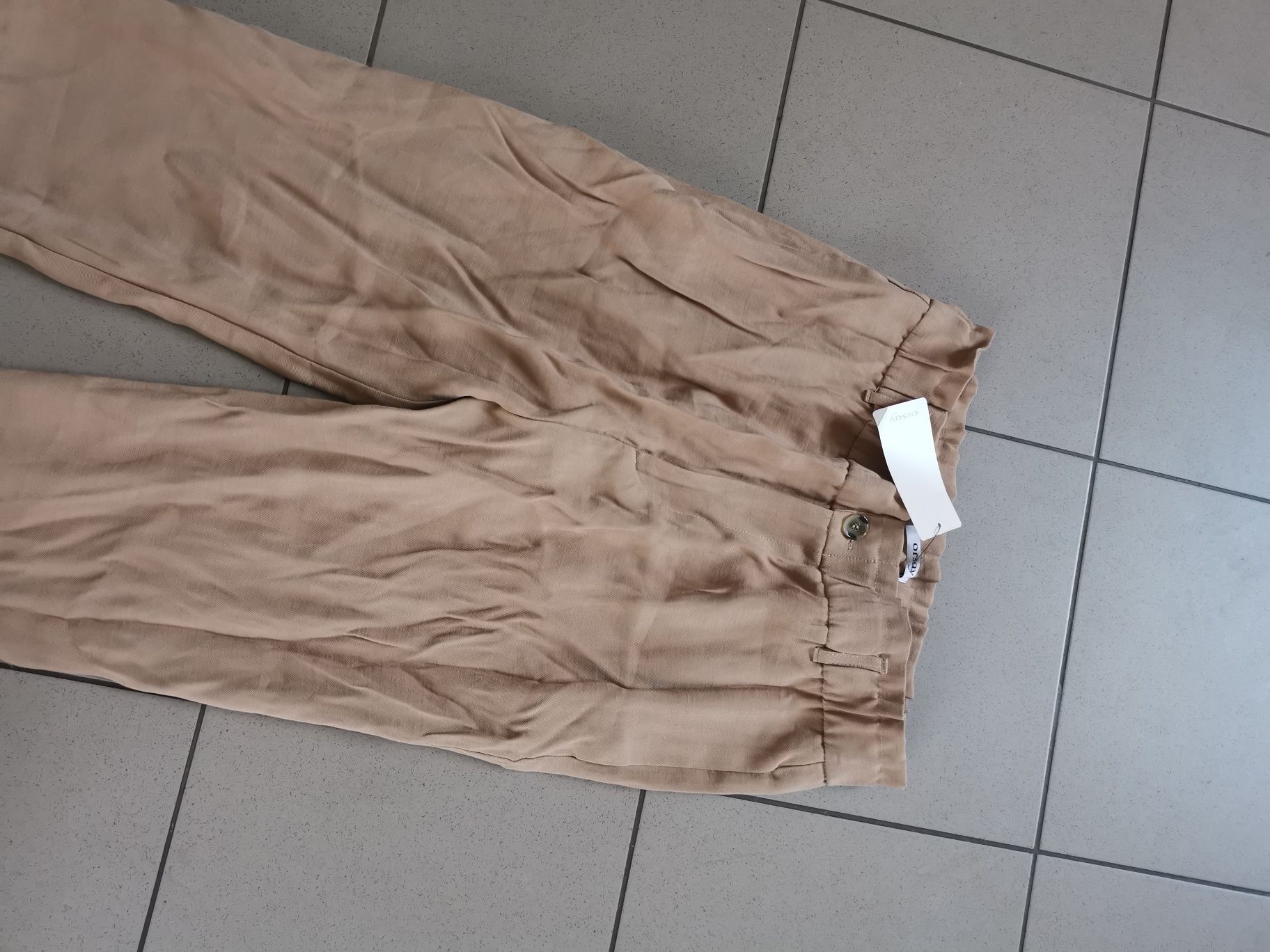 Nowe eleganckie luźne spodnie z wysokim stanem z mankietem L 40 camel