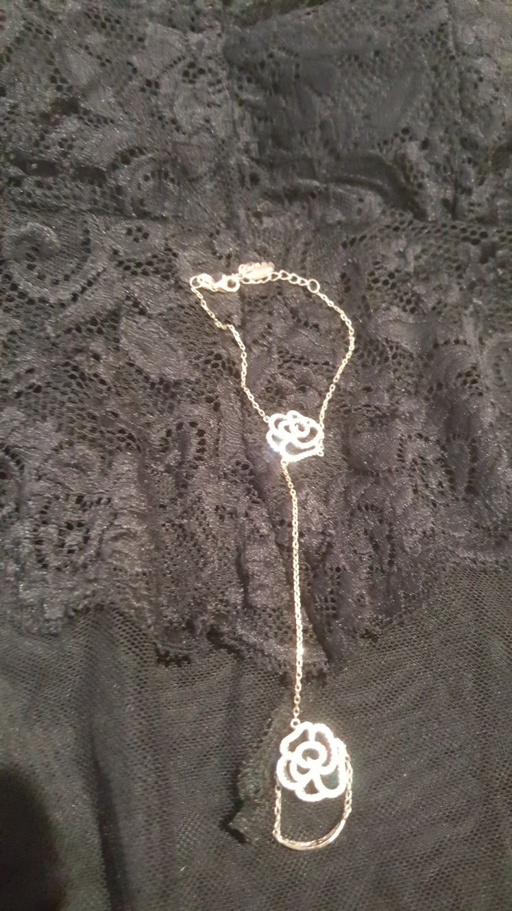 Anel novo e pulseira com anel
