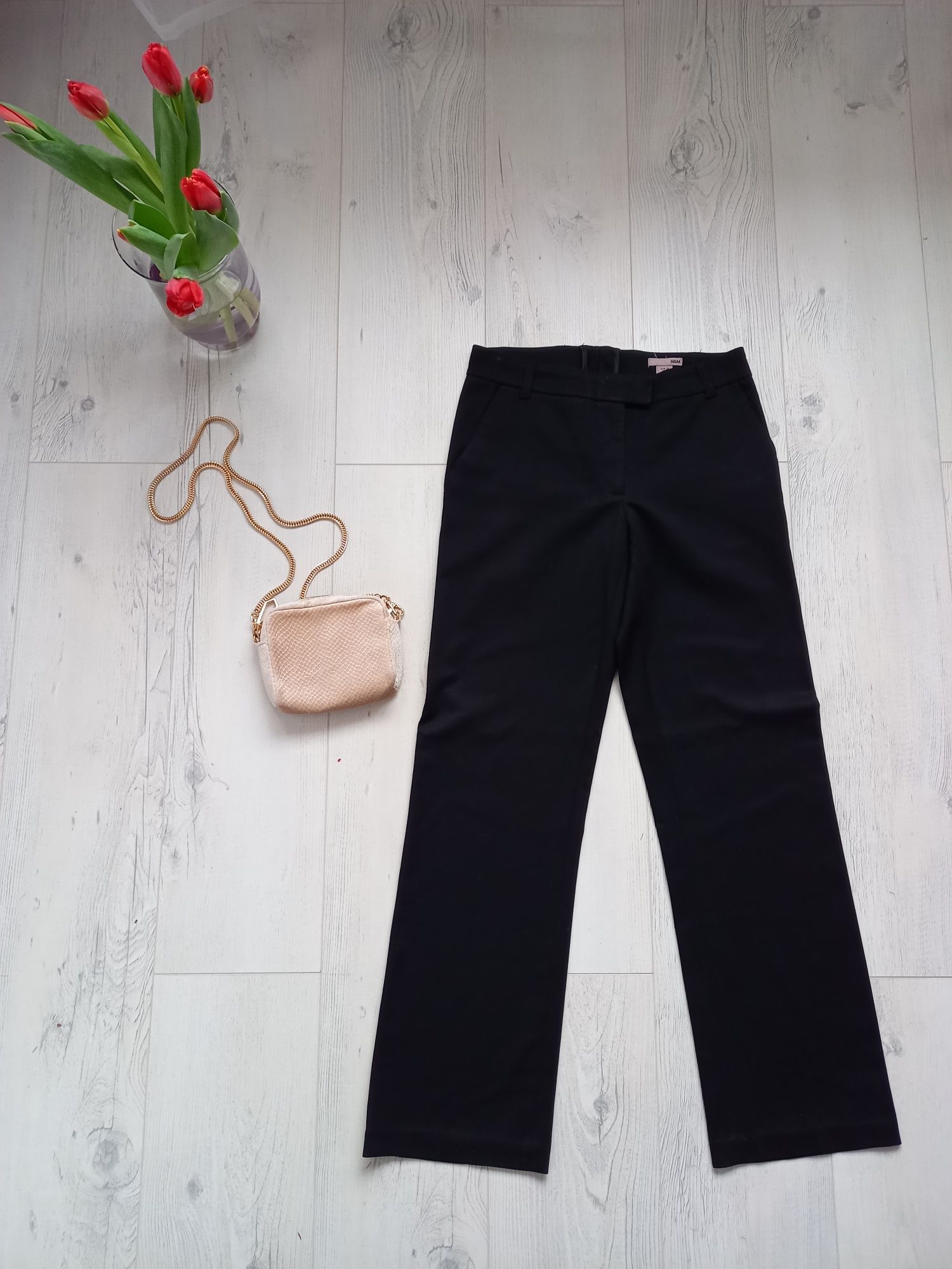 Eleganckie spodnie H&M czarne biurowe z kieszeniami proste klasyczne M