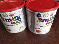 2 puste puszki po smilk max 1