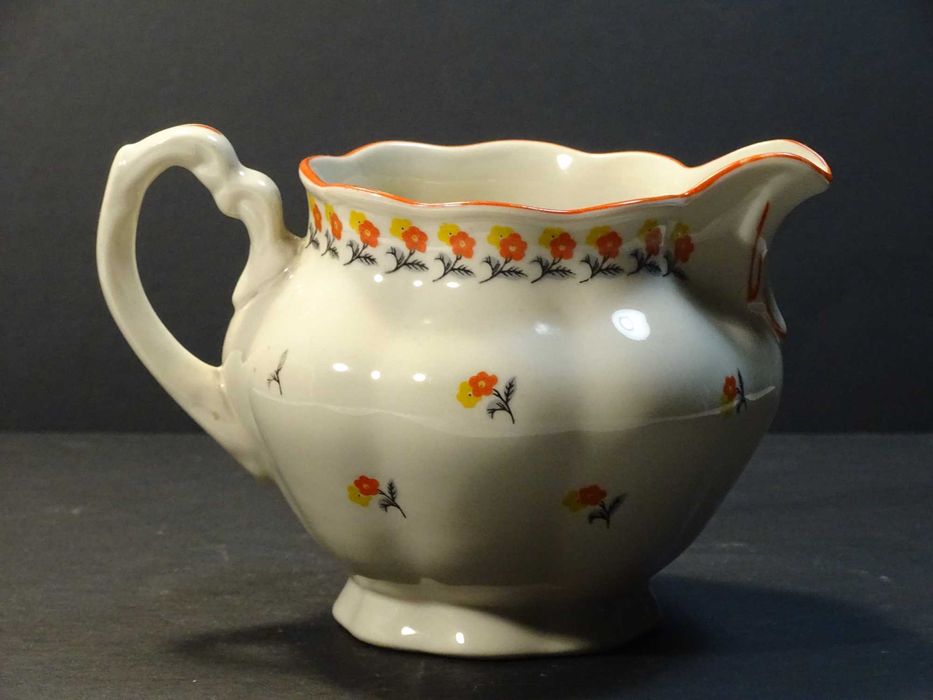 Porcelana Chodzież: piękny stary mlecznik.