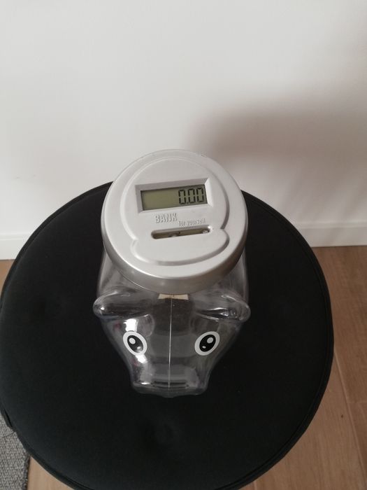 Porquinho mealheiro conta moedas