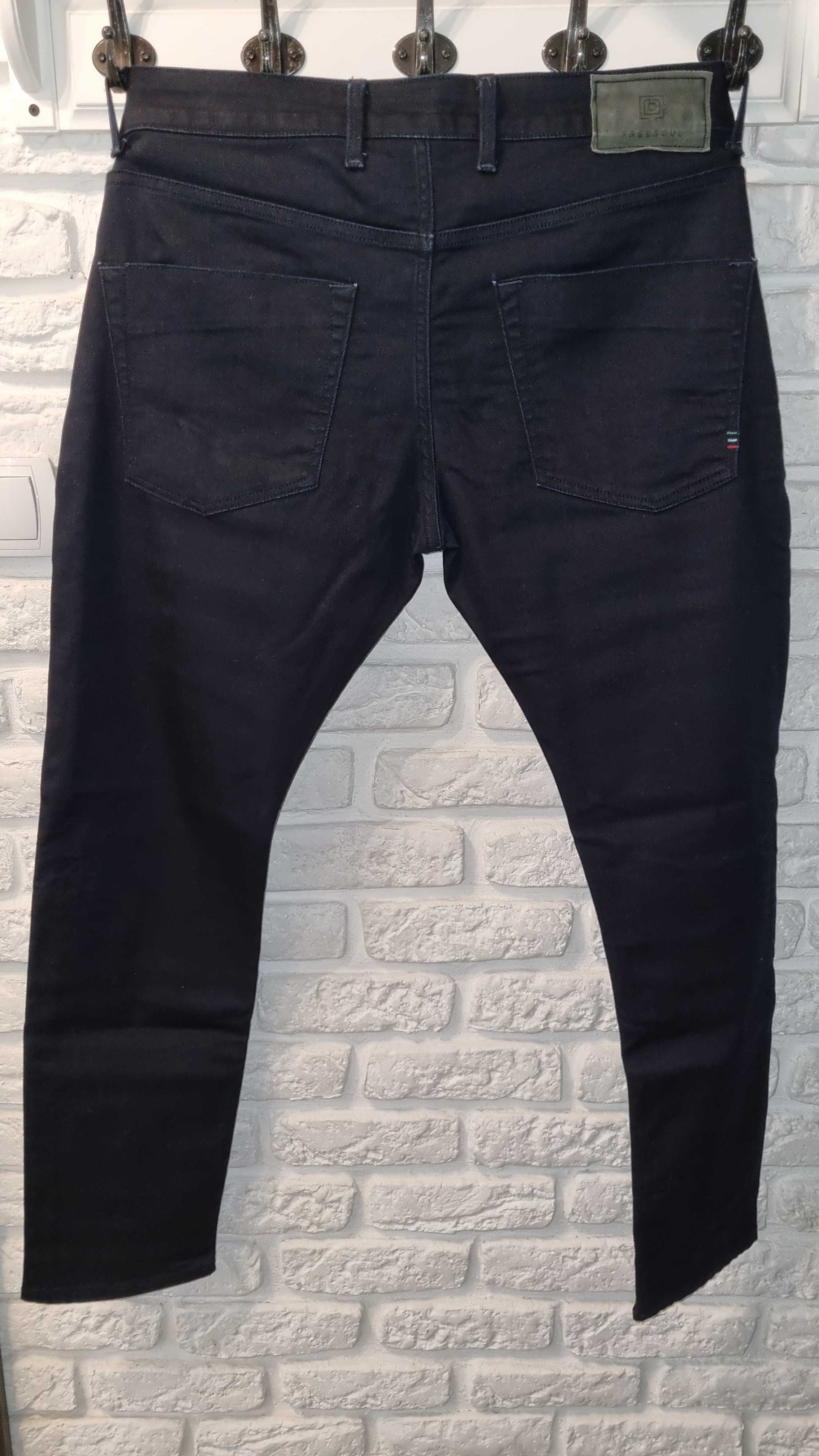 Markowe spodnie 34/34 męskie jeansy Free Soul granatowe jak nowe