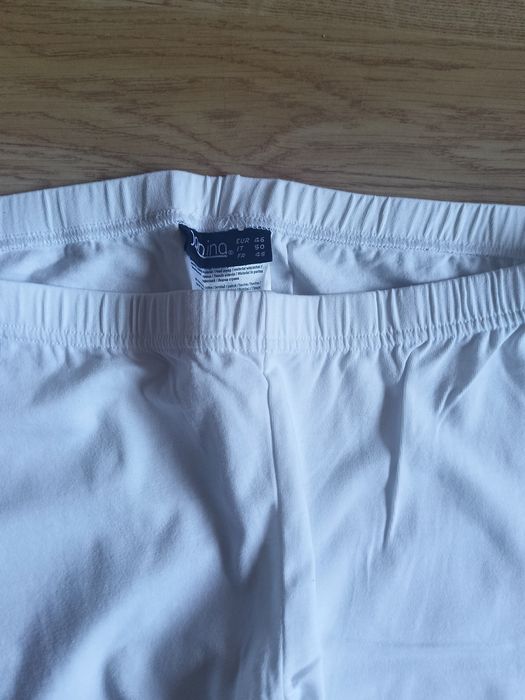 Białe legginsy z koronką 3/4 r 46